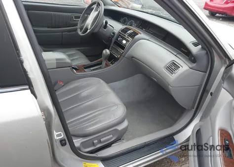 2001 Toyota Avalon Xls z USA, uszkodzony, nr VIN 4T1BF28B81U121468